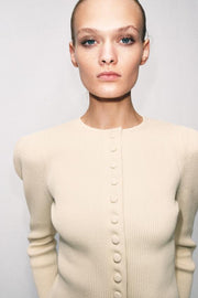 Veste en maille à manches bouffantes