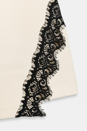 Jupe-culotte croisée en dentelle