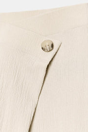 Pantalon croisé texturé