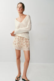 Short imprimé floral en dentelle