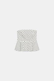 Top bustier peplum à pois