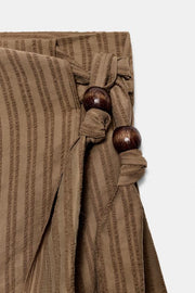 Jupe-culotte avec nœud à perles