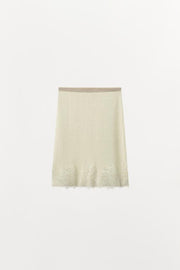Jupe midi en maille et dentelle brodée