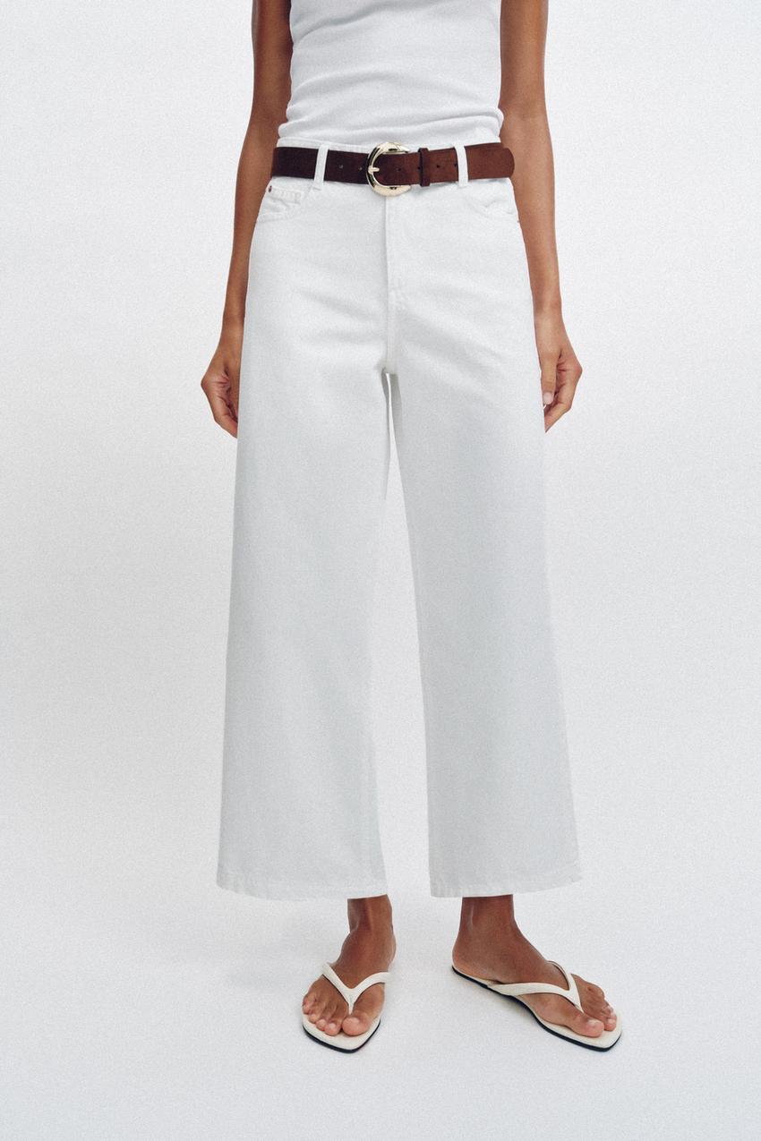Jean à jambe large court taille haute avec ceinture