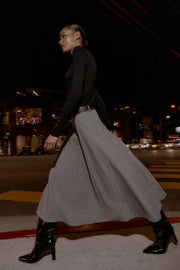 Jupe midi à carreaux avec ceinture