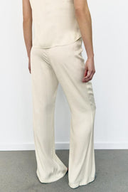 Pantalon coupe évasée satiné