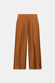 Pantalon fluide en lin à fentes au bas