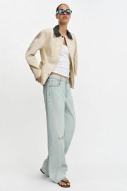 Blouson peplum à col contrasté
