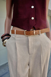 Pantalon en lin à pinces avec ceinture