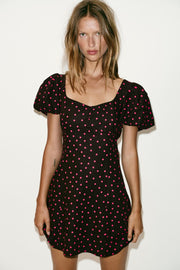 Robe à pois à manches bouffantes en lin