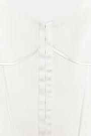 Top bustier à passepoils satinés