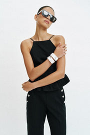 Pantalon coupe évasée à boutons
