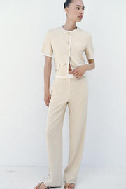 Pantalon droit en lin à taille contrastée