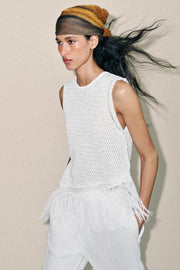 Top en maille à franges