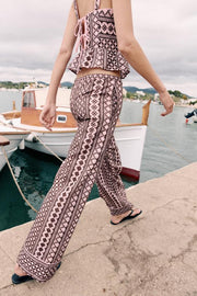 Pantalon large à broderies ajourées