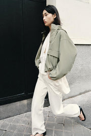 Blouson enduite à capuche