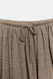 Jupe en tissu flammé à godets