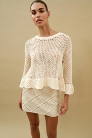 Pull en maille à volants