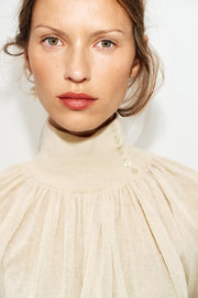 Blouse fluide en maille contrastée