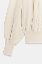 Blouse en maille à col bateau