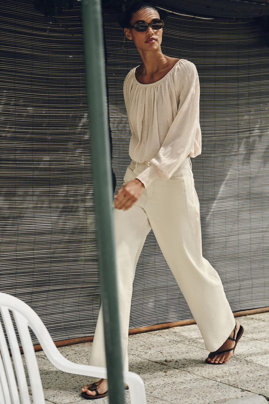 Blouse en maille à col bateau