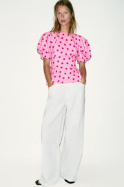 Top à pois à manches bouffantes
