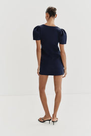 Robe courte en maille à manches bouffantes