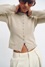 Veste en maille à boutons métalliques