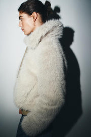 Manteau court effet fourrure à fermeture zippée