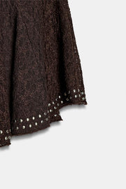 Jupe en dentelle à clous