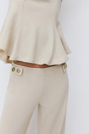Pantalon droit piqué à boutons
