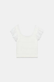 Top en maille à broderies ajourées