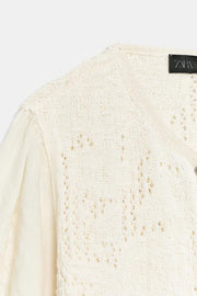 Veste romantique en maille contrastée
