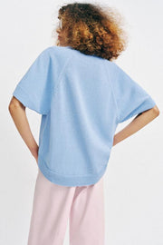 Pull en maille à bas arrondi et manches courtes