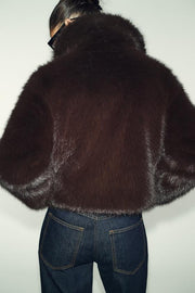 Manteau court effet fourrure à col revers