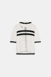 Veste en maille ajourée à manches courtes