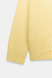 Pull en maille à bas asymétrique