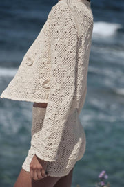 Veste en maille pointelle à fleurs