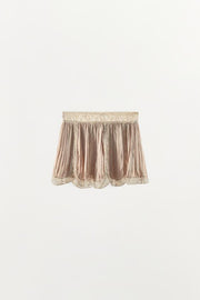 Jupe mini plissée en dentelle à perles