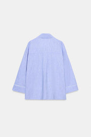 Blouse en lin à détails passepoilés
