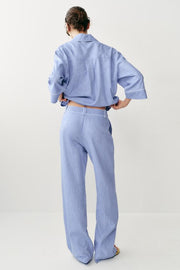Pantalon en lin à détails passepoilés