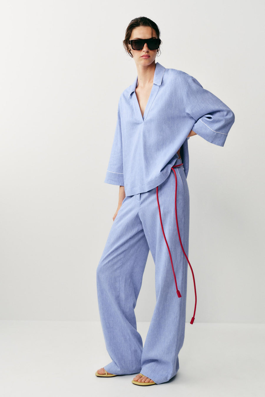 Pantalon en lin à détails passepoilés