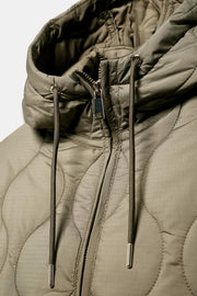 Blouson matelassé à capuche déperlant