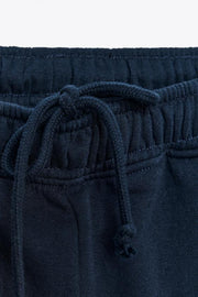 Pantalon basique en molleton, coupe droite et bas réglable