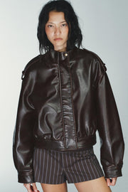 Blouson effet cuir à passants
