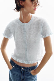 Veste en maille structurée à volants