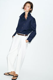 Pantalon à pinces avec ceinture