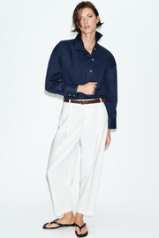 Pantalon à pinces avec ceinture