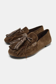 Mocassin en cuir à pompons